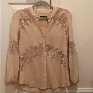 Cute light pink blouse with lace cut-out details!